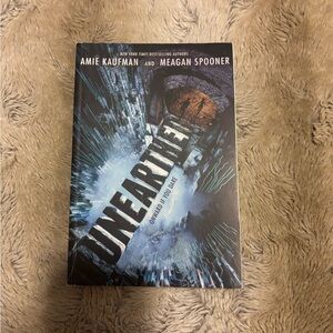 Unearthed by Amie Kaufman and Meagan spooner